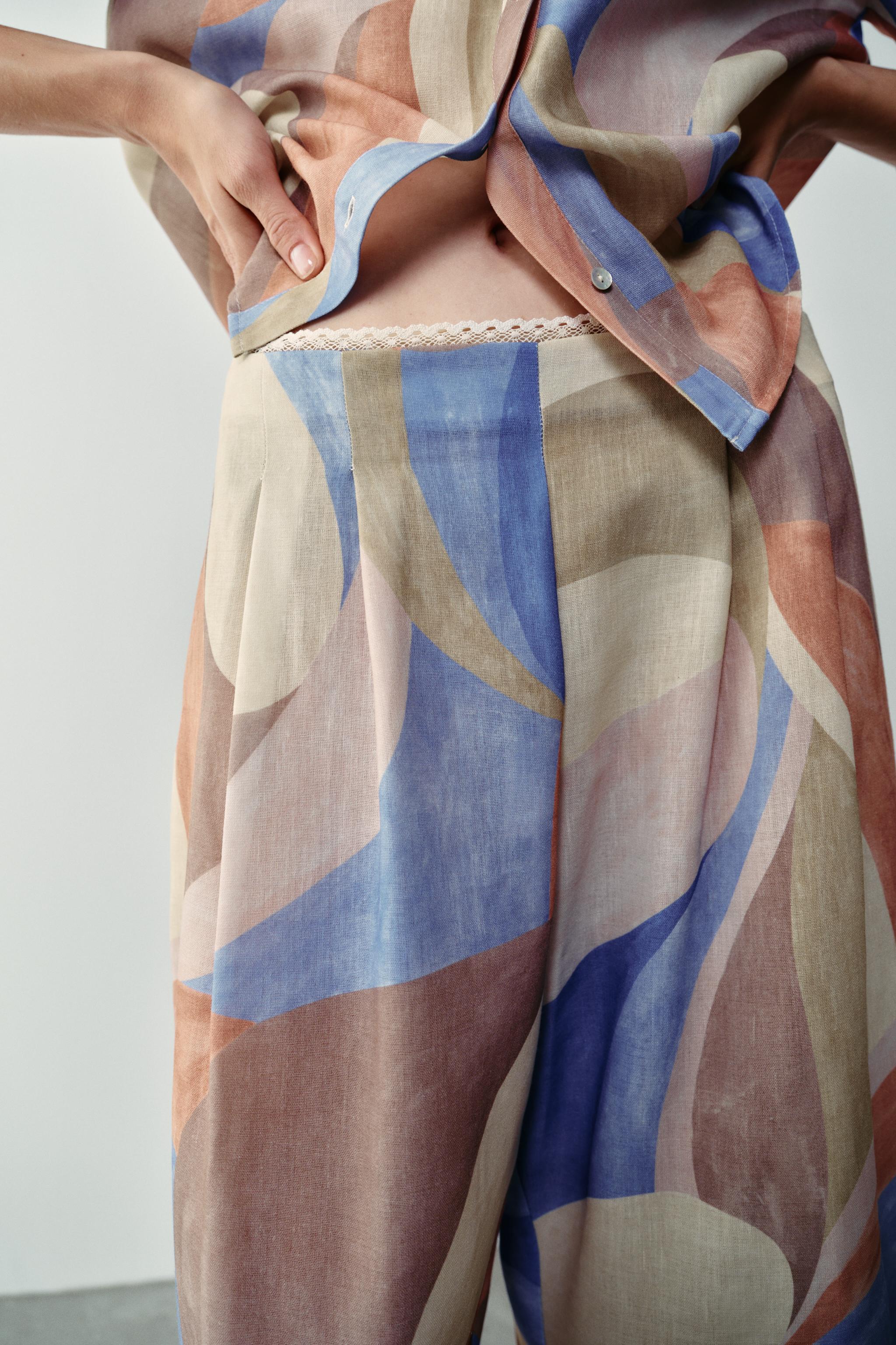 PRINTED WIDE-LEG TROUSERS